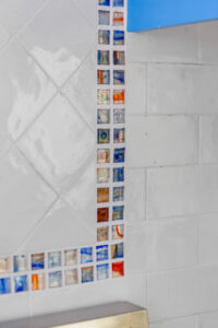 ceramic tile backsplash with colorful mosaic tile accents