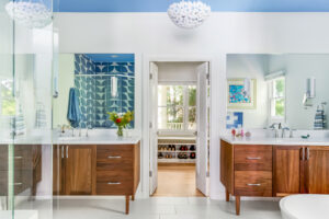 renovated master bath with dual vanities curbless shower and freestanding tub